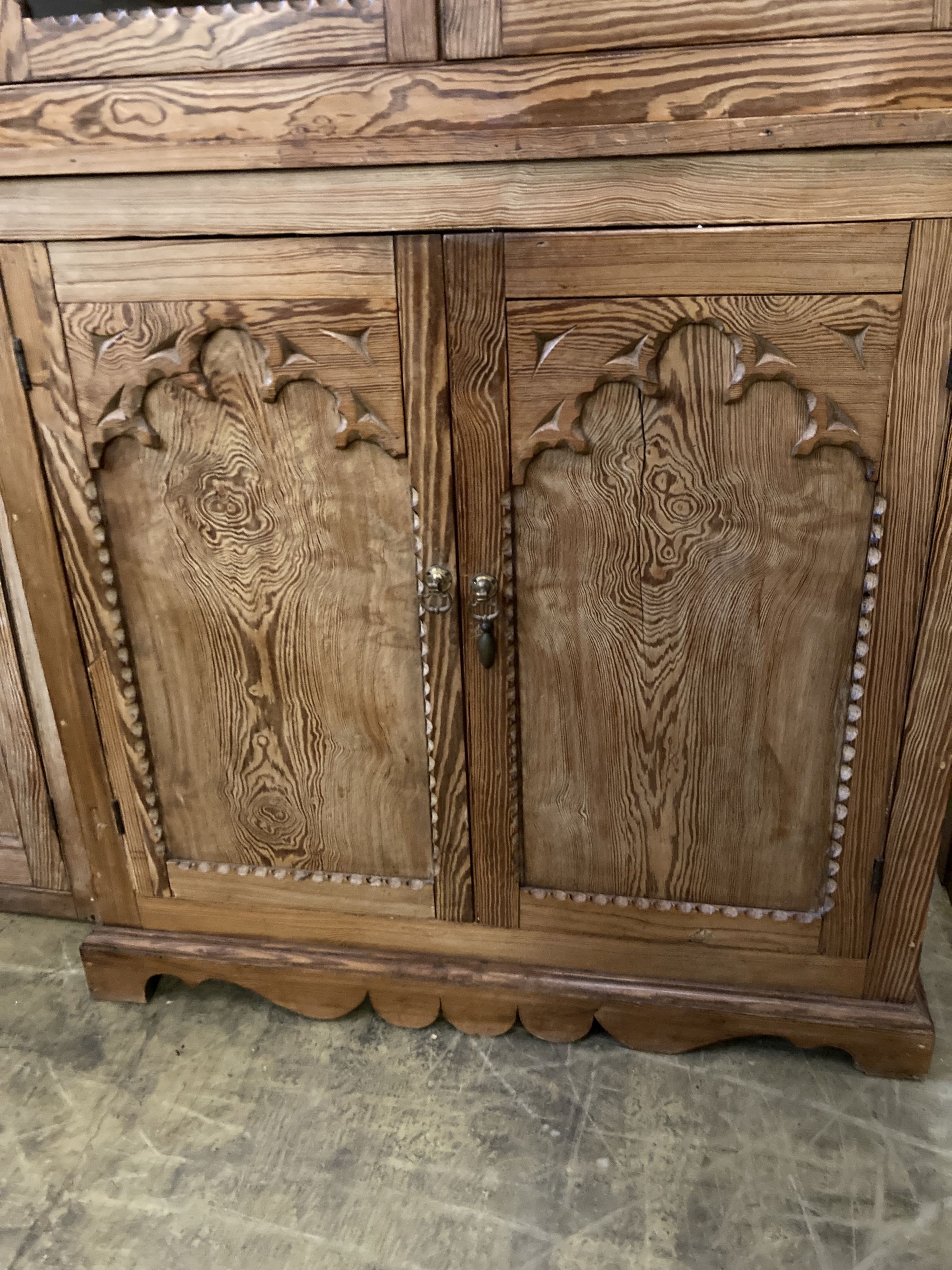 A 19th century Continental pine glazed cabinet, width 112cm, depth 49cm, height 214cm